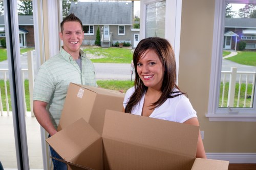 Customers and staff following safe procedures in a self storage facility