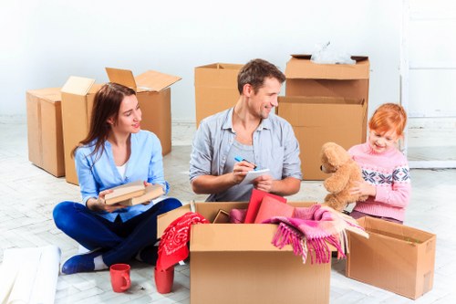 Removal team preparing flat items for a move in Knightsbridge